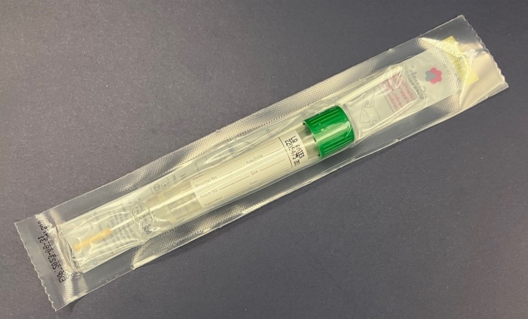 "An overhead image of a sealed, unopened Copan ESwab™ with flocked nylon mini tip and Amies liquid for Neisseria gonorrhoeae clinical specimen collection. "