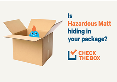 ""Hazardous Matt", a small blue figure with orange flame-like hair peeks out of an open cardboard mailing container. The question, "Is Hazardous Matt hiding in your package?"  appears next to the box and the PHMSA's "Check the Box" logo.  "