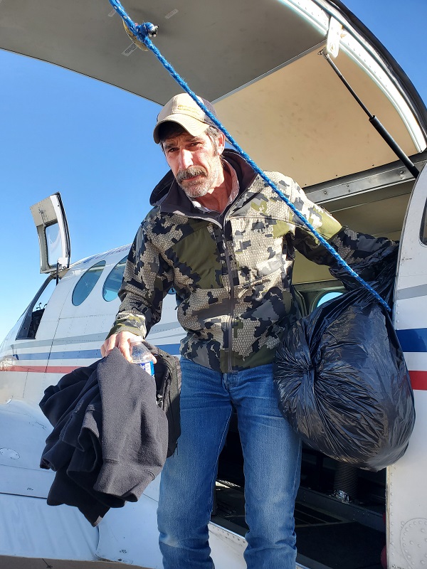 Crew member deboarding aircraft