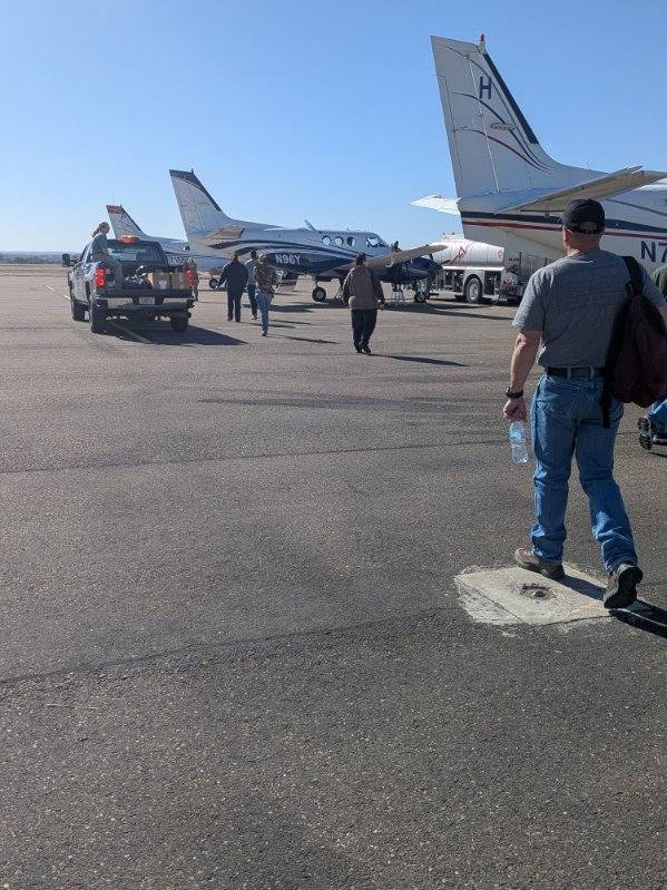 DSHS Region 7 flyer heading to aircraft