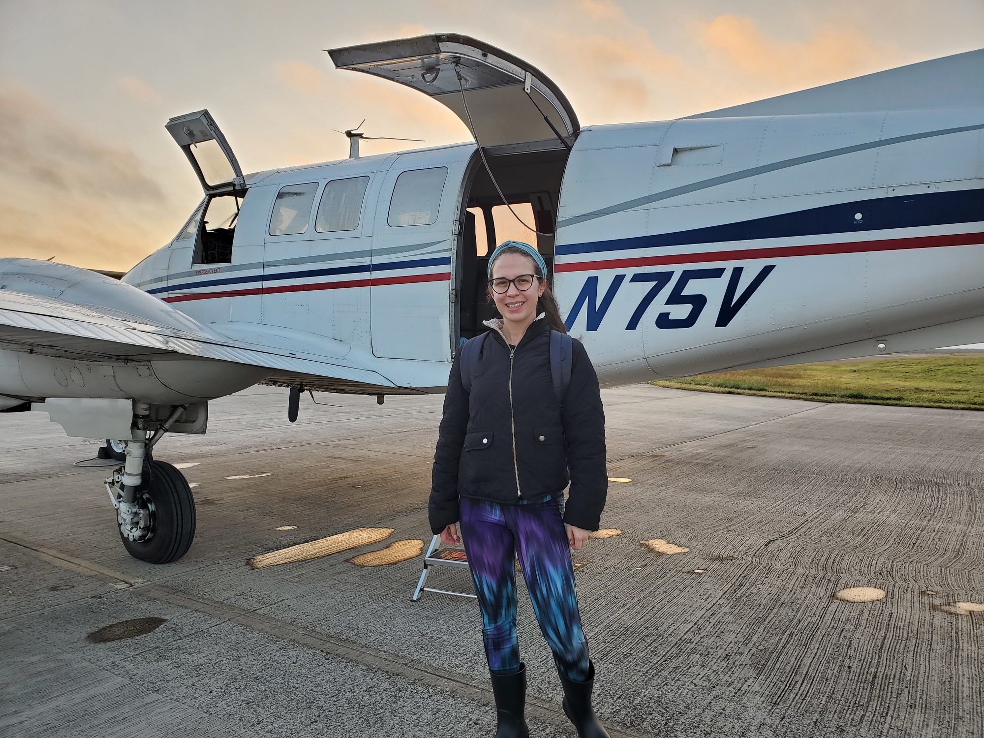 Crew member in front of aircraft
