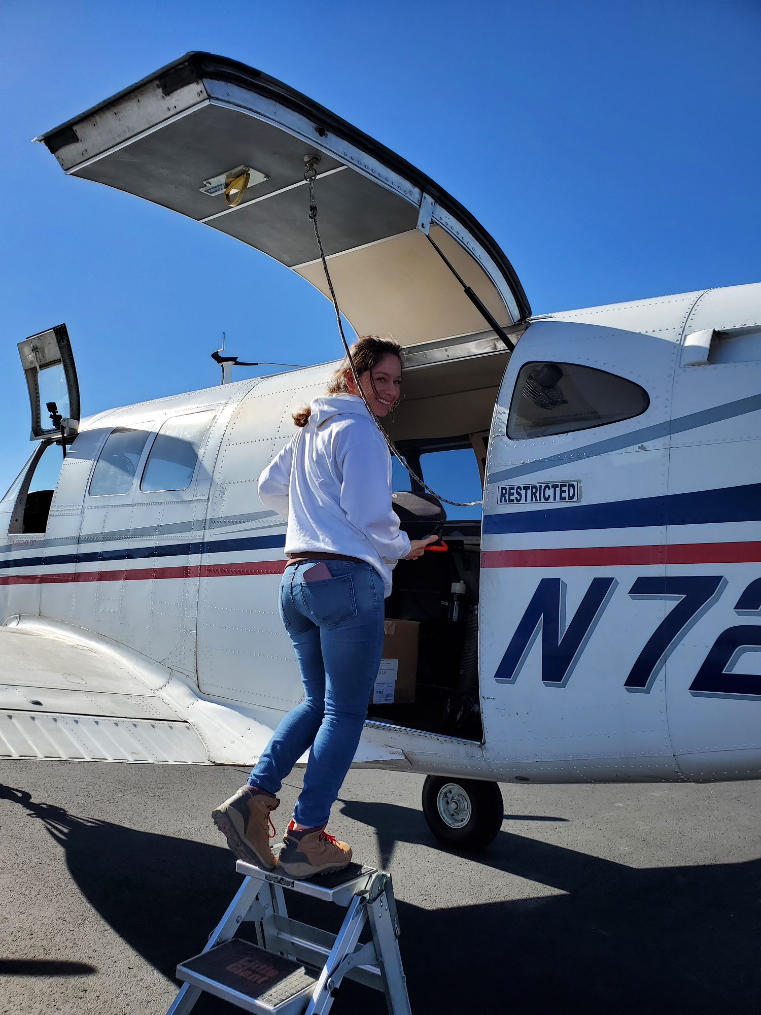 Crew member boarding aircraft