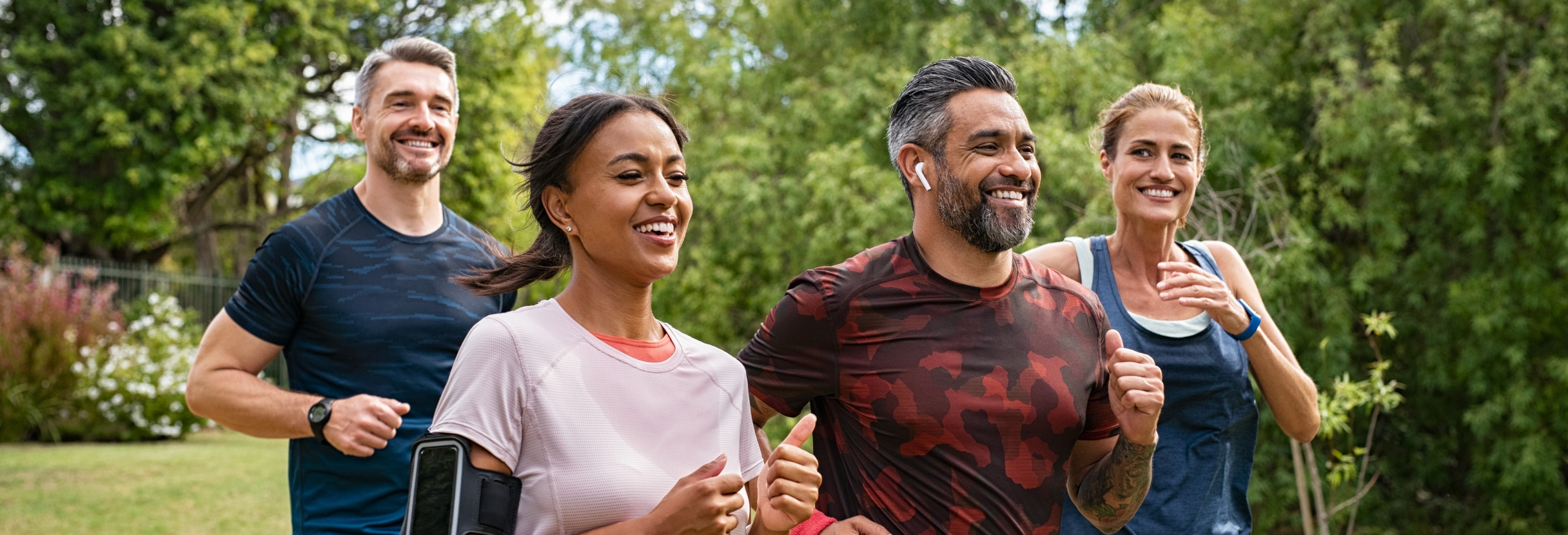 People jogging in an outdoor setting.