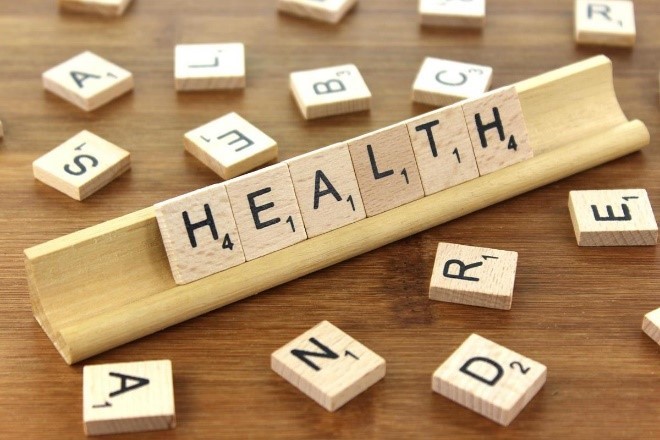 Health spelled in Scrabble tiles. 