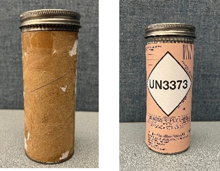 Close up view of cylindrical outer mailer with its metal lid closed