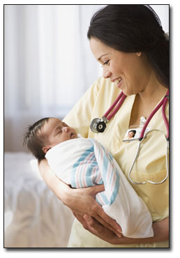 "Nurse holding a newborn baby"