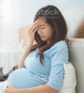 Pregnant Woman with a headache