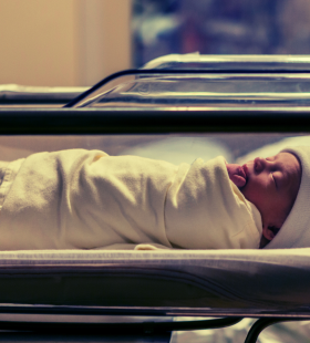 image of baby in crib