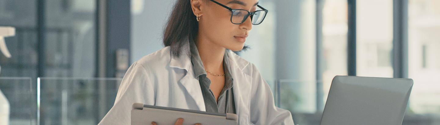 Female doctor using digital tablet