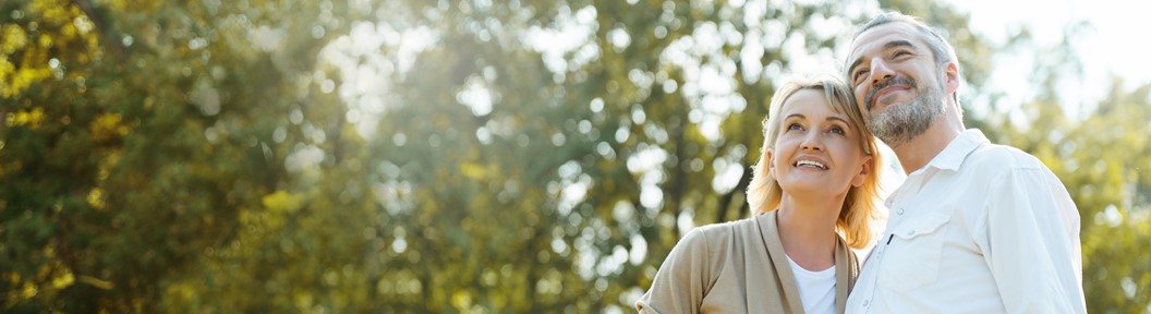 People standing in a sunny field, decorative