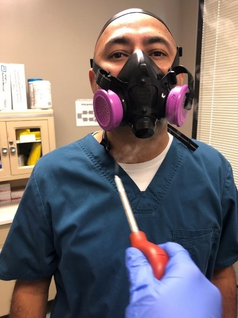 Respiratory Therapist conducts a qualitative fit test for a mask